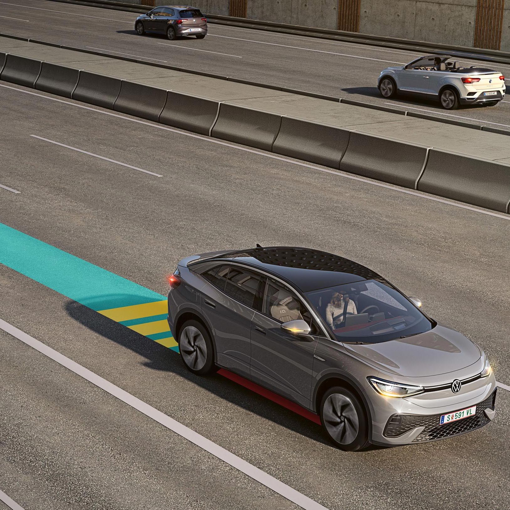 VW ID.5 med vožnjo v mestnem prometu. Vključen je sistem Emergency Assist, katerega delovanje je shematsko prikazano na sliki.