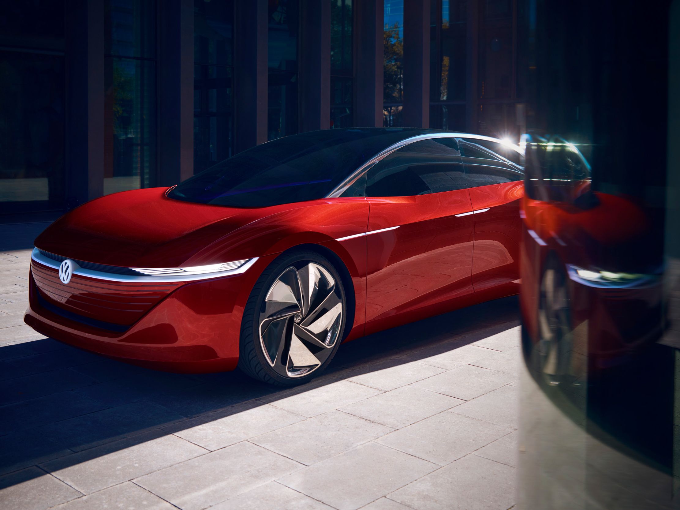 VW ID. Vizzion električni avto rdeča sprednji del pogled od strani