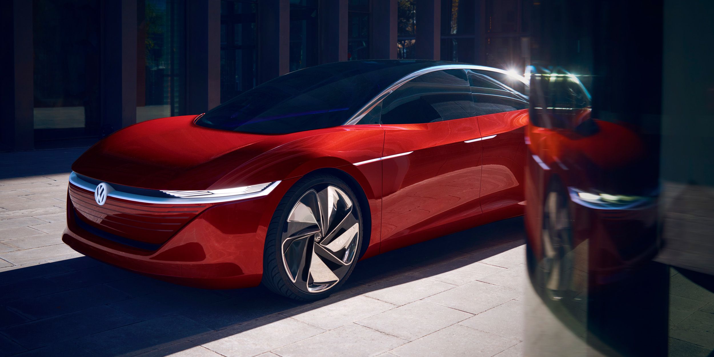 VW ID. Vizzion električni avto rdeča sprednji del pogled od strani